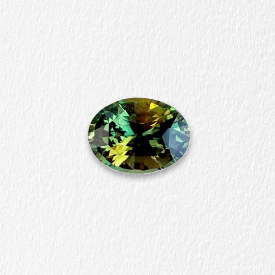 1.56 Carat Yellow Green Parti Oval Sapphire