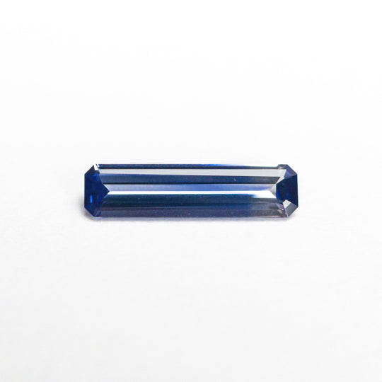 0.32ct 8.95x2.25x1.39mm Cut Corner Rectangle Step Cut Sapphire 23166-01