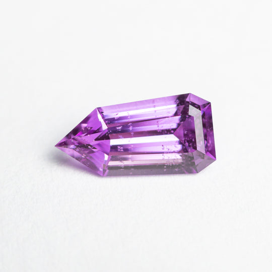 1.32ct 9.81x4.96x3.48mm Shield Step Cut Sapphire 23734-01