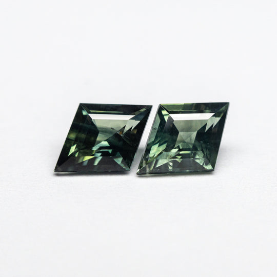 0.95cttw 2pc 7.00x5.03x2.67mm 7.05x5.08x2.68mm Lozenge Step Cut Sapphire Matching Pair 22768-16