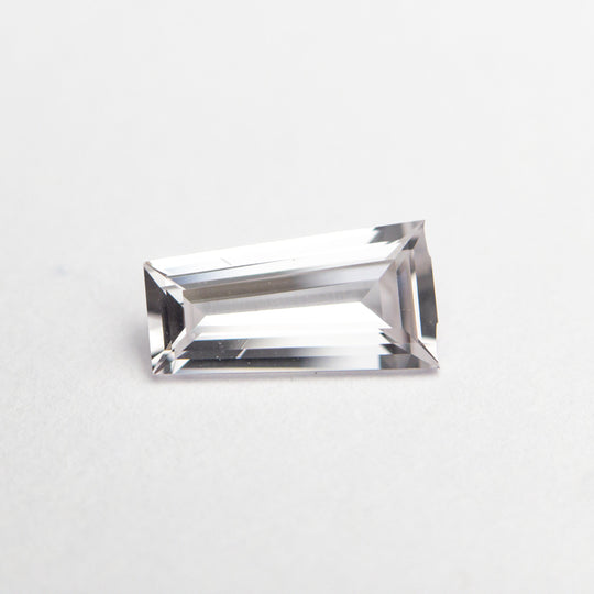 0.69ct 7.78x4.05x2.32mm Tapered Baguette Step Cut Sapphire 22850-01